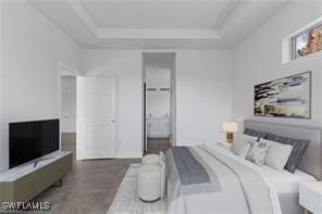 bedroom featuring a tray ceiling