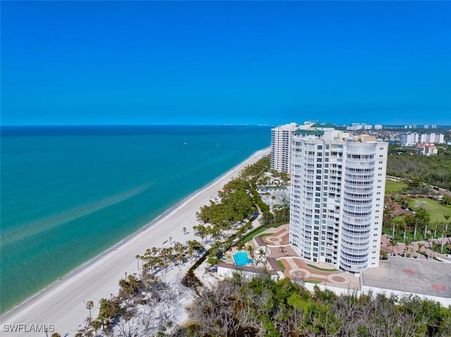 8111 Bay Colony Dr Unit 701, Naples, FL 34108 - aerial view of extended coastline and apartment complex