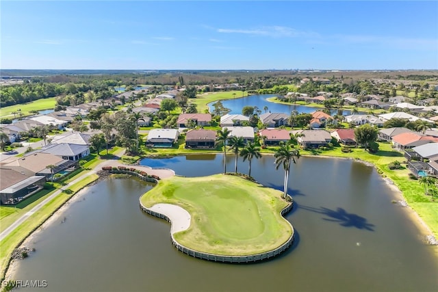 birds eye view of property with a water view and a residential view