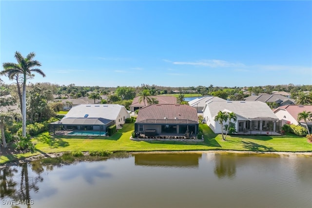 bird's eye view with a residential view and a water view