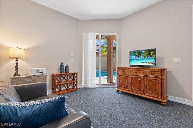 living area with carpet flooring and baseboards