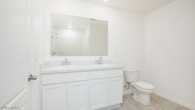 full bathroom with walk in shower, a sink, toilet, and double vanity