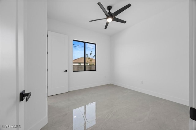 611 NW 25th Ter, Cape Coral, FL 33993 - spare room with ceiling fan and baseboards