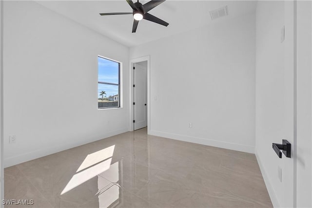 611 NW 25th Ter, Cape Coral, FL 33993 - unfurnished room featuring a ceiling fan and baseboards