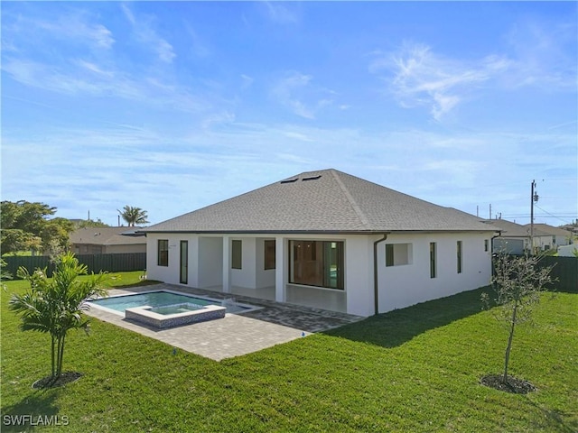 611 NW 25th Ter, Cape Coral, FL 33993 - back of property featuring a patio, roof with shingles, stucco siding, and a pool with connected hot tub