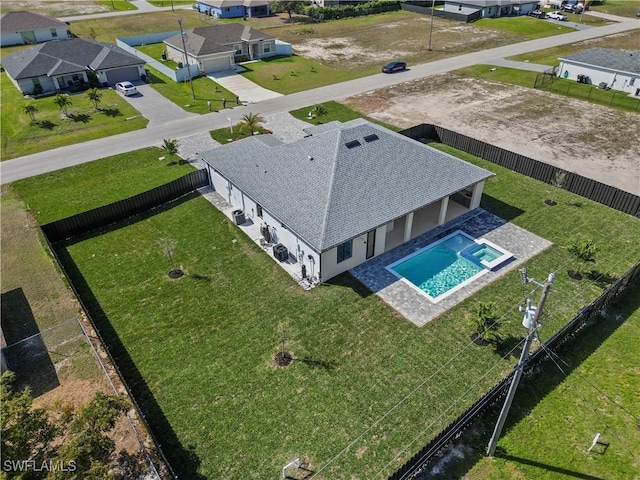 611 NW 25th Ter, Cape Coral, FL 33993 - aerial perspective of suburban area featuring a pool area