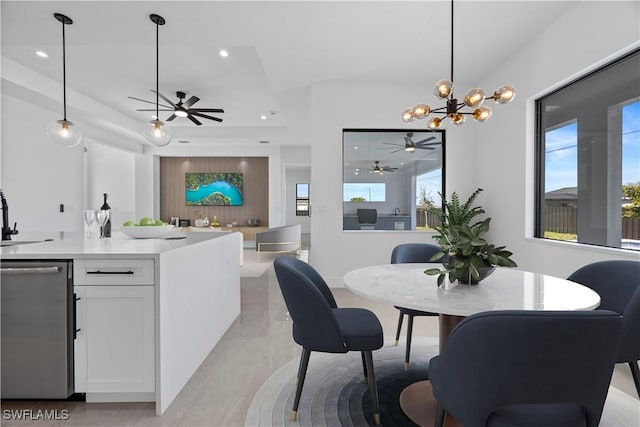 611 NW 25th Ter, Cape Coral, FL 33993 - dining room with a ceiling fan, a chandelier, healthy amount of natural light, and recessed lighting