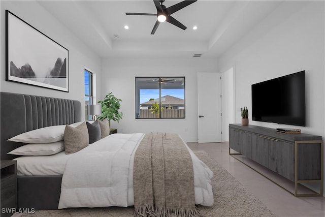 611 NW 25th Ter, Cape Coral, FL 33993 - bedroom with a raised ceiling, recessed lighting, and ceiling fan