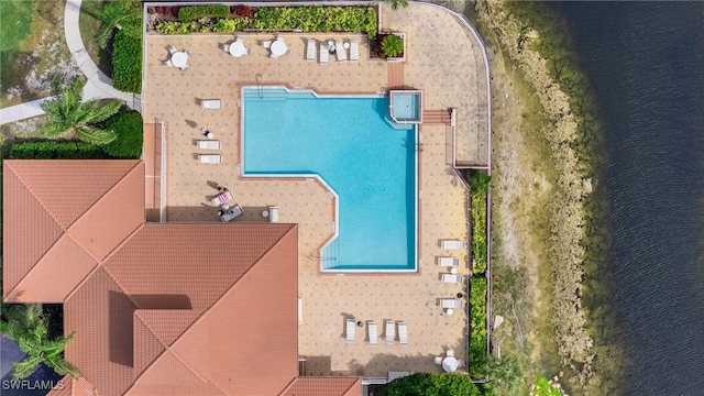 birds eye view of property featuring a water view