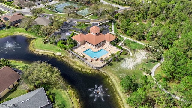 birds eye view of property featuring a water view