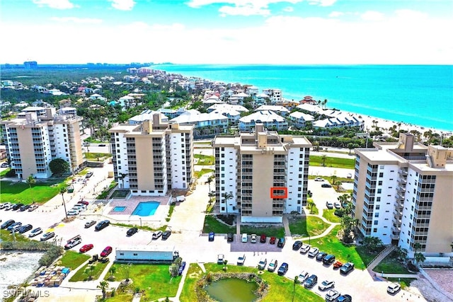 aerial view with a city view and a water view