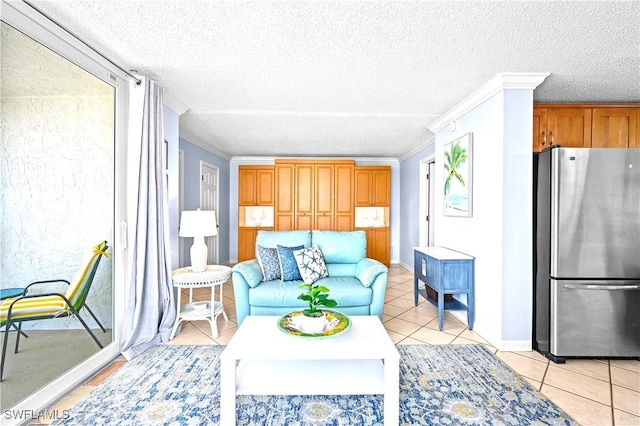 living area with light tile patterned floors, a textured ceiling, and crown molding