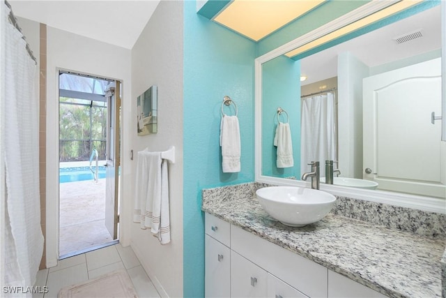 full bath with visible vents and vanity