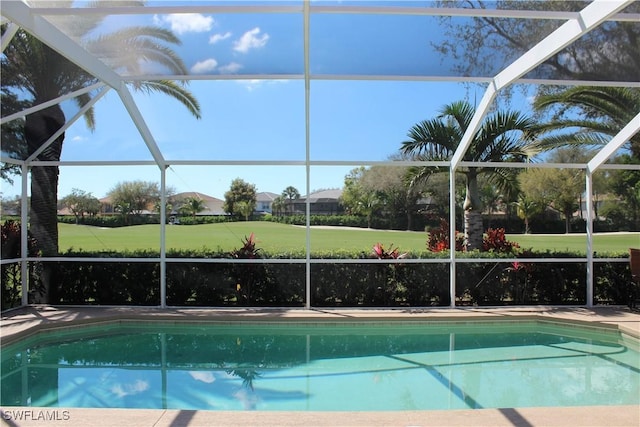 outdoor pool featuring a lanai