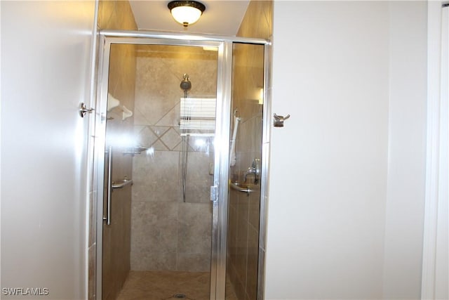 full bathroom with a shower stall