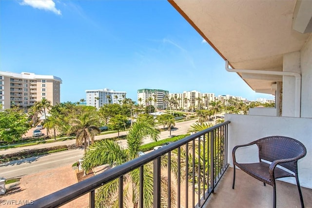 balcony featuring a city view