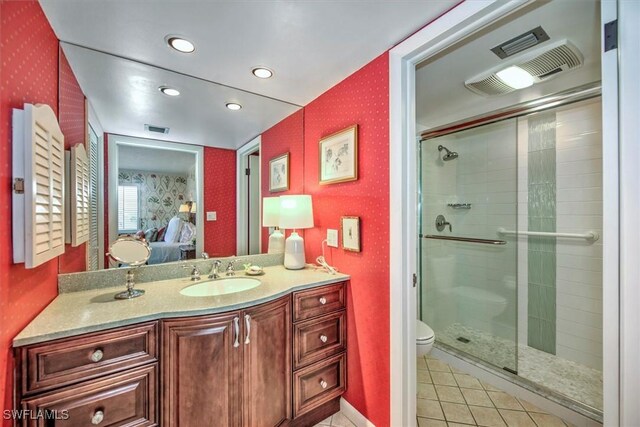 full bath with wallpapered walls, visible vents, connected bathroom, and a stall shower