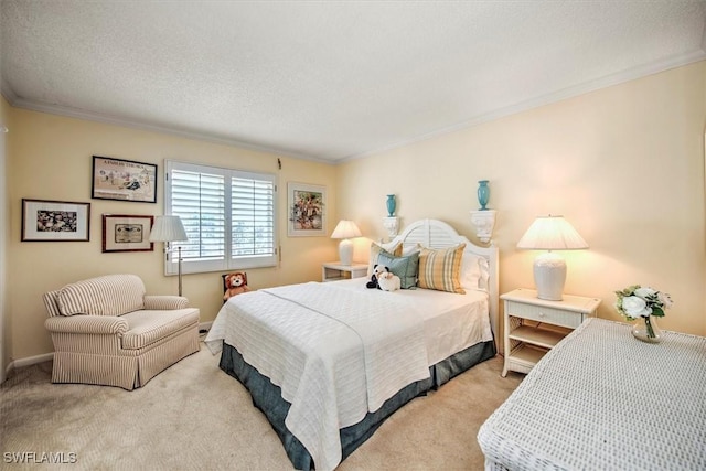 bedroom featuring a textured ceiling, carpet floors, and ornamental molding