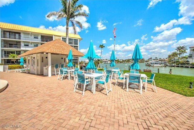 view of patio / terrace with a water view