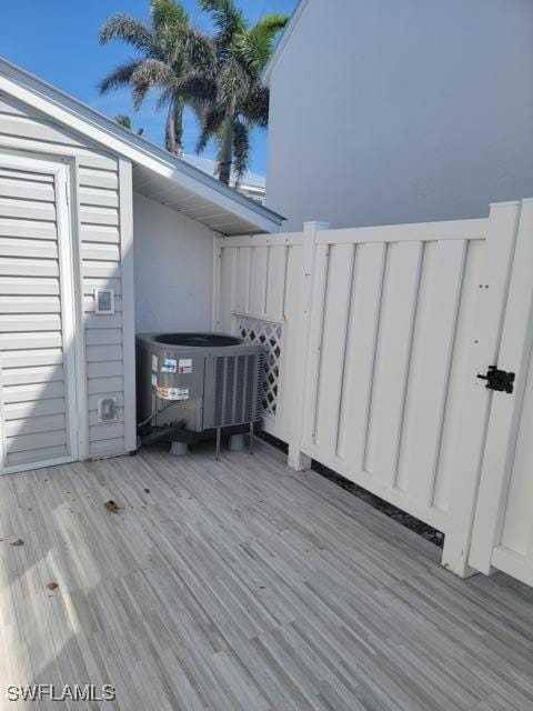 wooden terrace with central AC unit