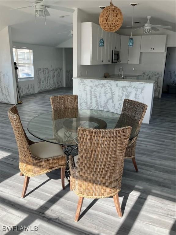 dining area with a ceiling fan