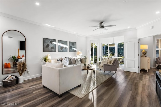 living area featuring dark wood-style floors, recessed lighting, baseboards, and crown molding