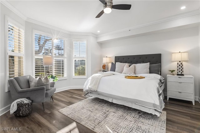 bedroom featuring baseboards, dark wood-style flooring, and crown molding