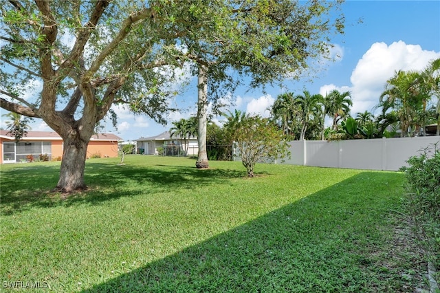 view of yard with fence