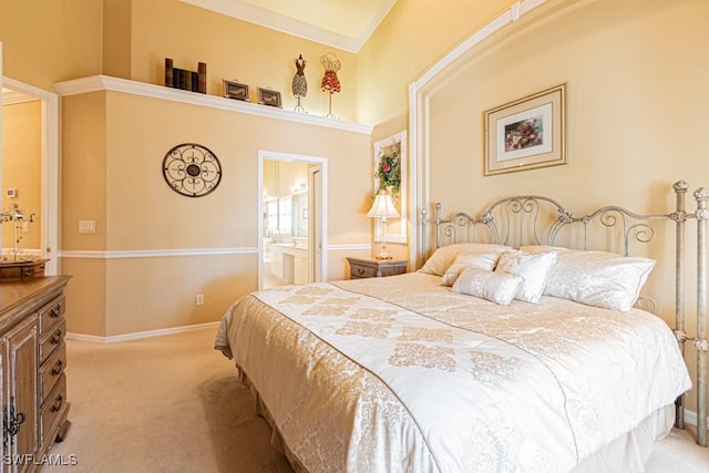 2109 Morning Sun Ln, Naples, FL 34119 - bedroom with light carpet, baseboards, and ensuite bath
