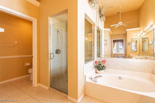 2109 Morning Sun Ln, Naples, FL 34119 - full bath with a bath, toilet, tile patterned floors, and a stall shower
