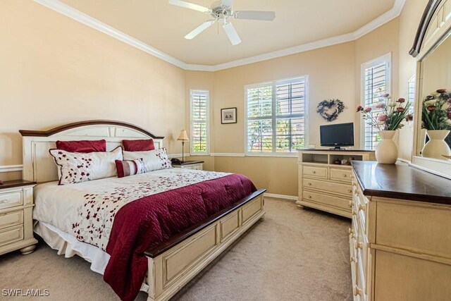 2109 Morning Sun Ln, Naples, FL 34119 - bedroom featuring a ceiling fan, crown molding, baseboards, and light colored carpet