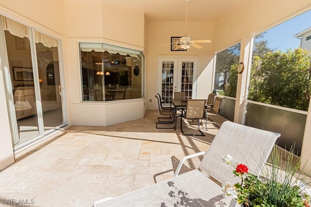 2109 Morning Sun Ln, Naples, FL 34119 - sunroom with ceiling fan and french doors