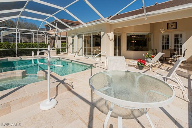 2109 Morning Sun Ln, Naples, FL 34119 - view of swimming pool featuring a pool with connected hot tub, a patio area, french doors, and a ceiling fan