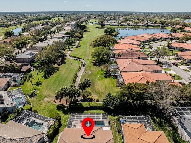 2109 Morning Sun Ln, Naples, FL 34119 - bird's eye view featuring a water view, view of golf course, and a residential view