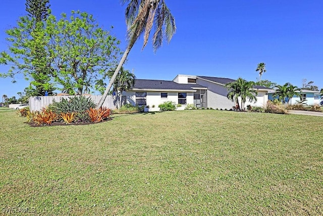 view of yard featuring fence