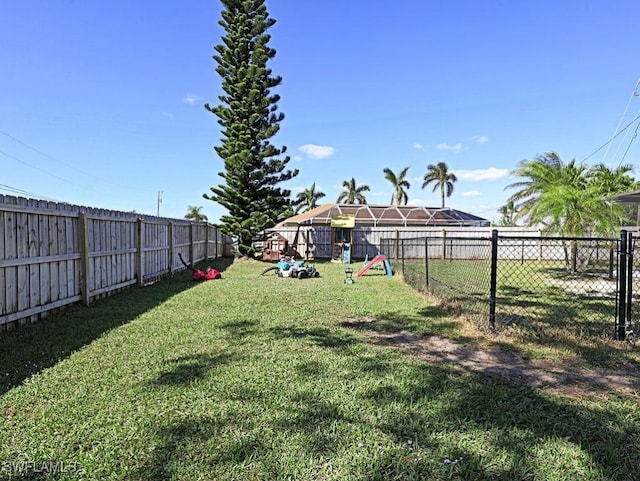 view of yard with a fenced backyard