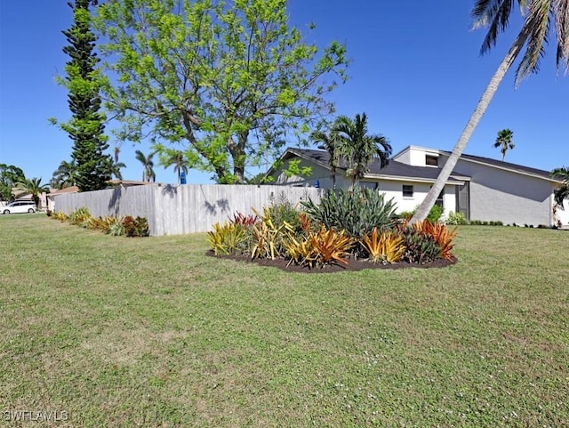 view of yard with fence