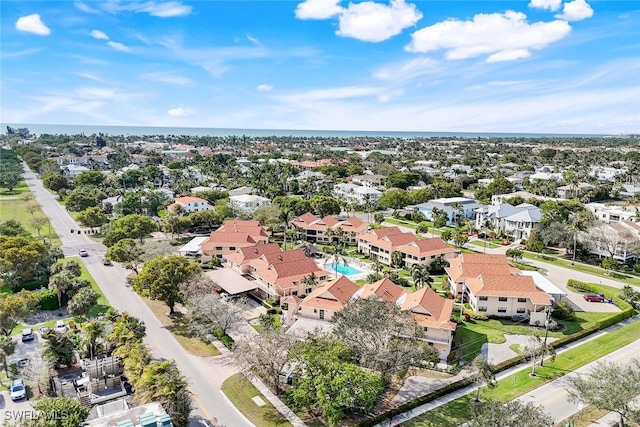 birds eye view of property with a residential view