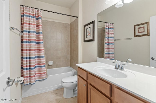 bathroom with shower / tub combo with curtain, vanity, toilet, and tile patterned floors