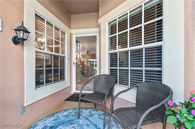 balcony featuring a sunroom