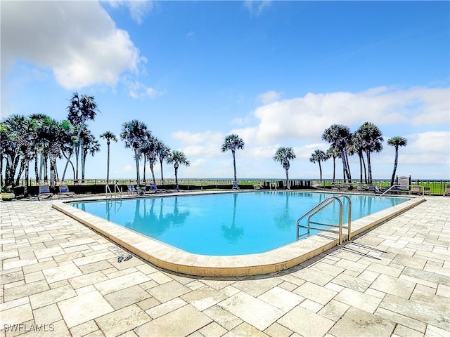 pool featuring a patio