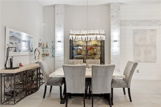 dining room with a high ceiling