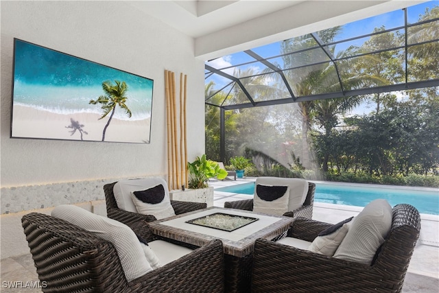 interior space with glass enclosure, a fire pit, and an outdoor pool