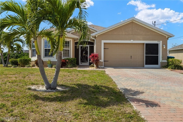 ranch-style house with a front lawn, decorative driveway, an attached garage, and stucco siding