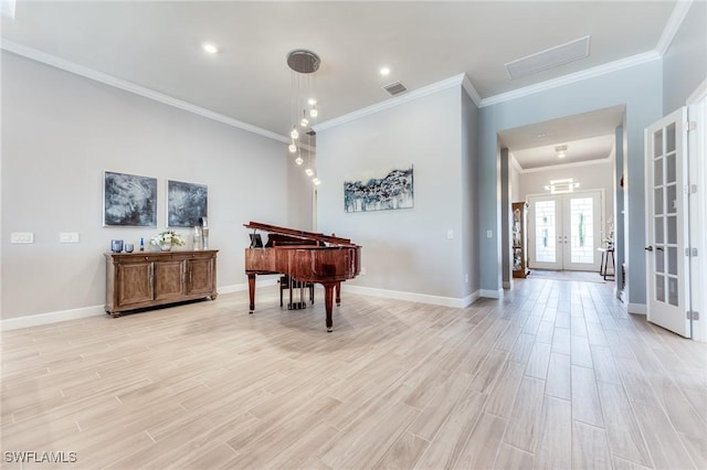 playroom with baseboards, french doors, visible vents, and light wood-style floors