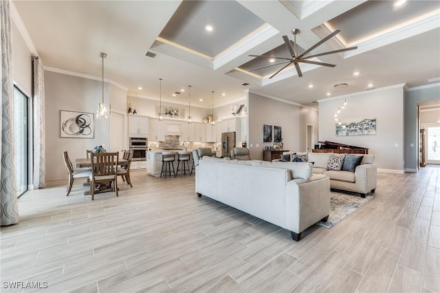 living area featuring crown molding, wood tiled floor, ceiling fan, coffered ceiling, and baseboards