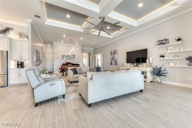 living area featuring crown molding, coffered ceiling, visible vents, and wood tiled floor