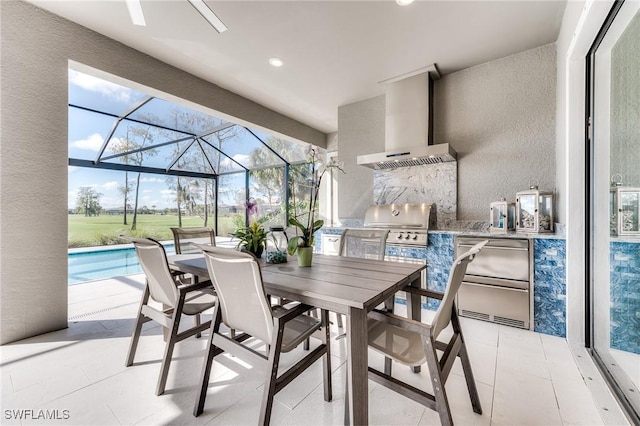 view of patio featuring outdoor dining area, area for grilling, an outdoor kitchen, a lanai, and a swimming pool