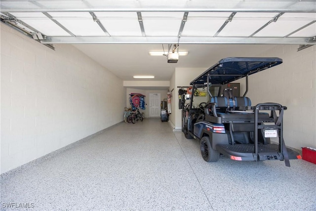 garage featuring a garage door opener