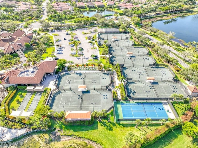 bird's eye view featuring a residential view and a water view